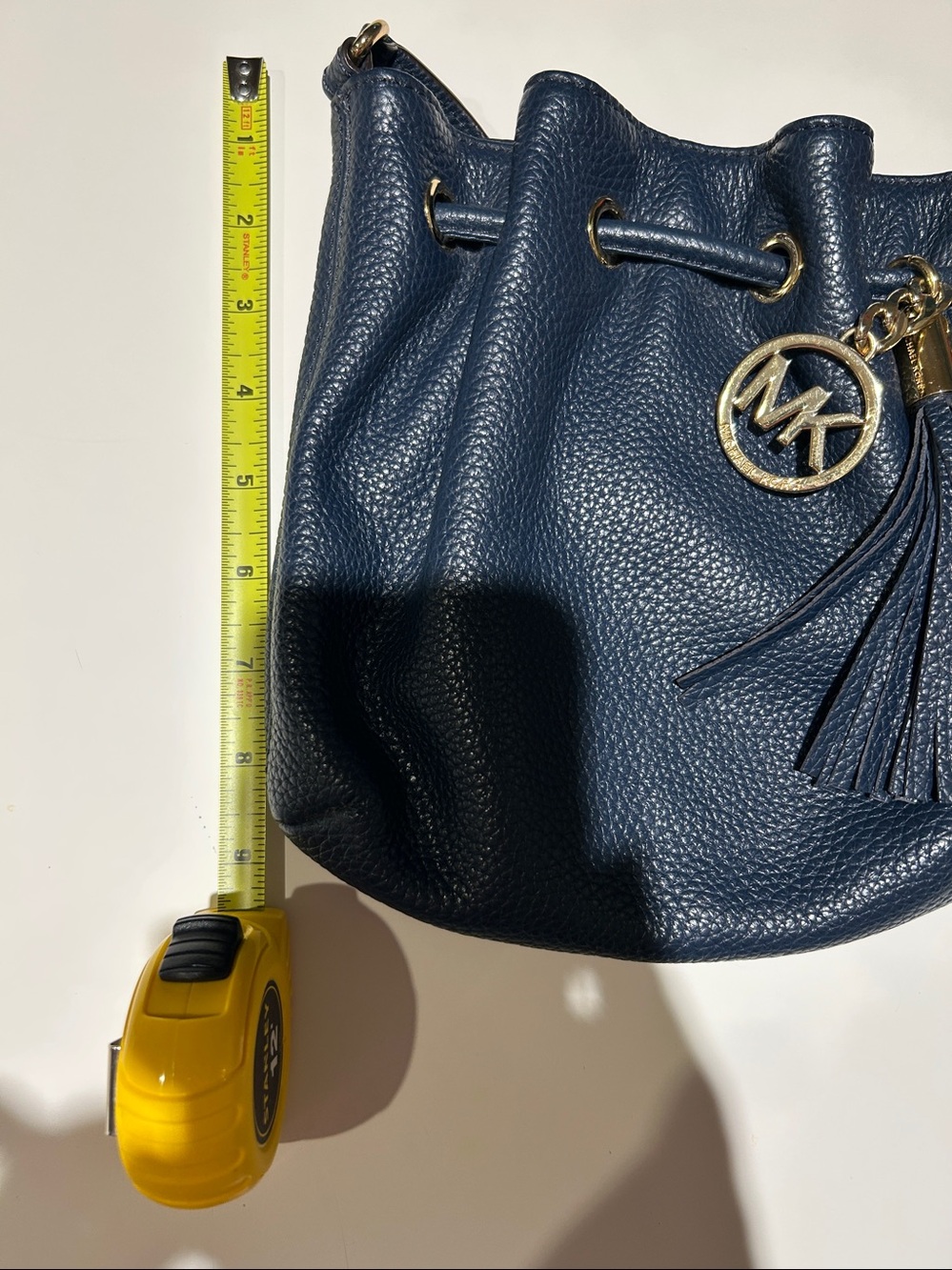 Michael Kors Navy Pebbled Leather Drawstring Crossbody with Gold MK Charm - Picture 10 of 11